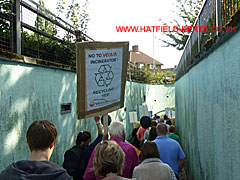 Marchers entering the underpass entrance opposite the swim centre