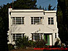 White, two-storey, Art Deco style house, Ellenbrook area