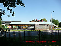 The Town Inn, Town Centre - post-war single storey building with a green roof