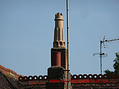 Stone or salt glaze Smoke Cure set above another stack with a single red clay Roll pot