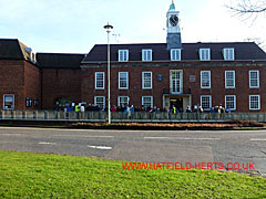 View of the marchers in front of WHBC offices from across The Campus