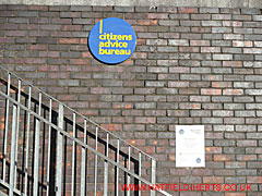 Citizens Advice Bureau logo, notice and stairs
